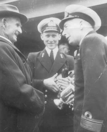 Walter Bassett, Midshipman T. A. Dadswell and Rear Admiral J. A. Collins